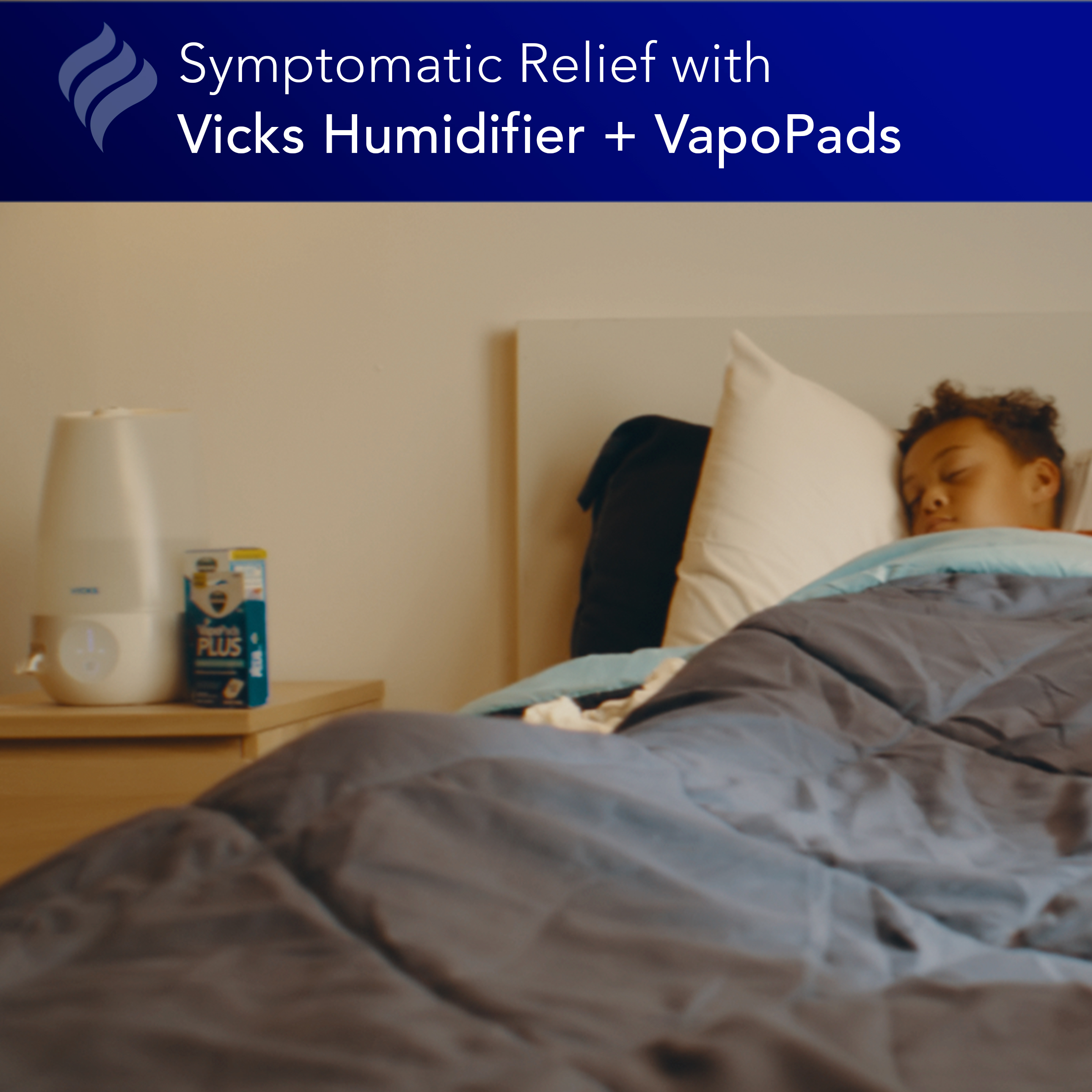 A child sleeping in a small bedroom and Vicks Filter Free Cool Mist Humidifier on the night stand with text Symptomatic relief with vicks humidifier and vapopads