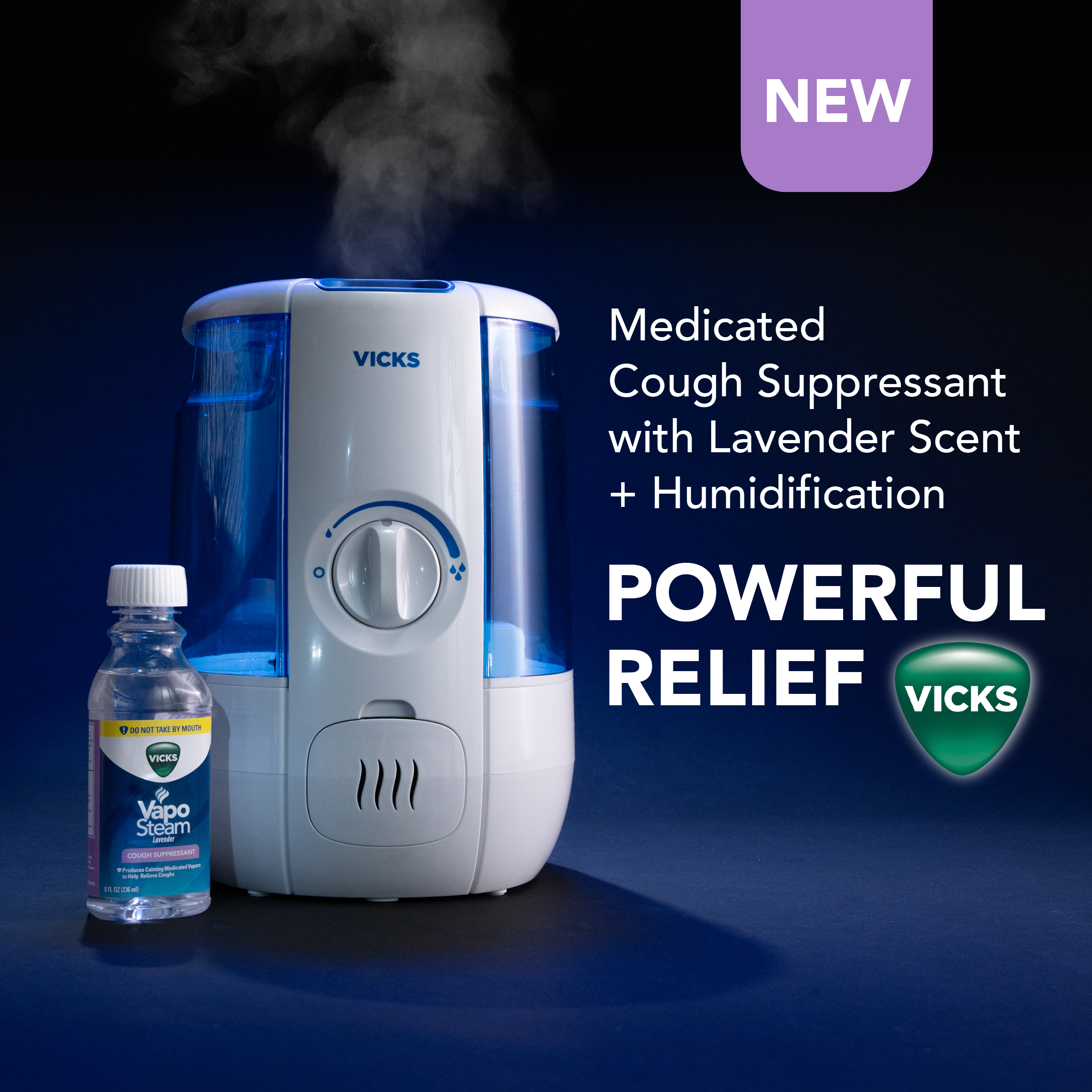 Vicks Cool Mist humidifier device releasing soothing vapors, placed next to Vicks Vaposteam bottle on a dark blue background with text Medicated Cough Suppressant plus humidification equals to powerful relief and Vicks logo